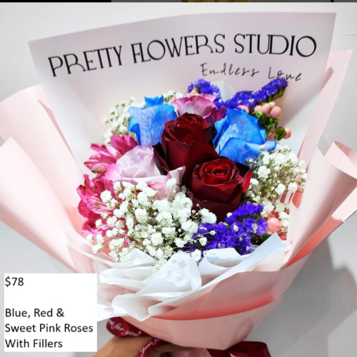 Blue, Red, & Sweet Pink Roses With Fillers